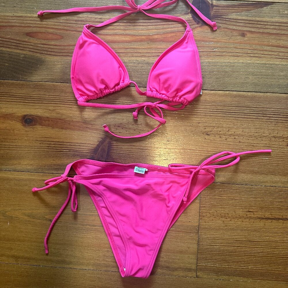 Neon pink Bikini. Tied top and bottoms. Removable Pads.